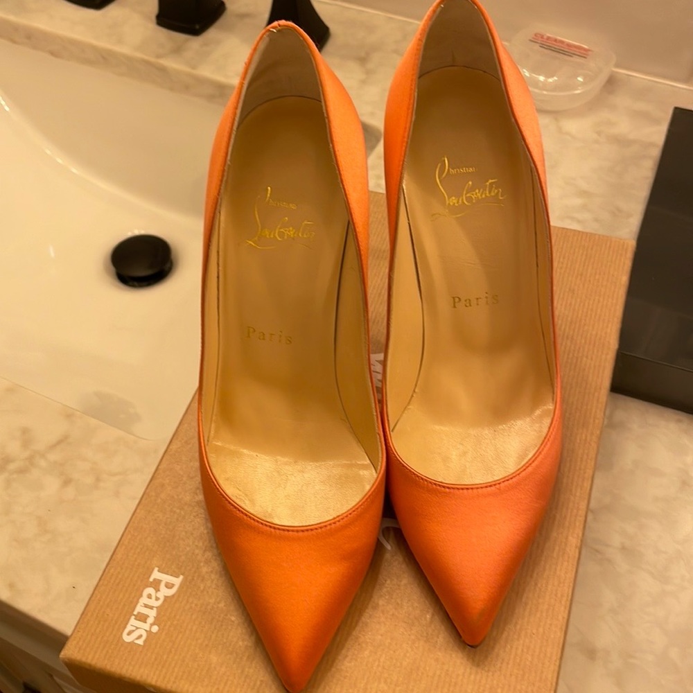 Light pink satin Louboutins